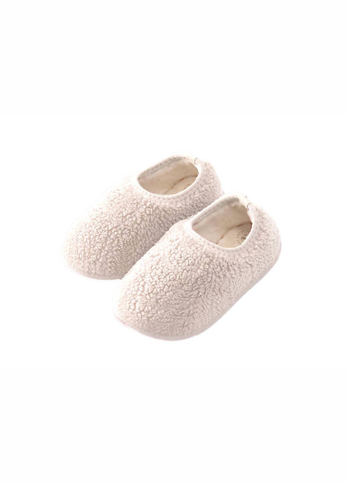 Chaussons souples antidérapants Slogges coloris Vanille pour bébé et enfant.
